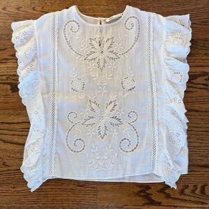 Zara embroidered flowy white blouse.
Doen type style